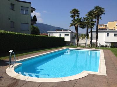 3 1/2 Zimmer, sonnige Gartenwohnung mit Schwimmbad in Lugano (Caslano)